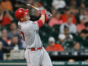 Mike Trout of the Los Angeles Angels of Anaheim hits a home run in the ninth inning against the Houston Astros at Minute Maid Park on April 20, 2017 in Houston, Texas.  (BOB LEVEY/Getty Images)