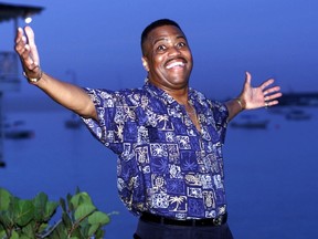 In this Aug. 18, 1999 file photo, Cuba Gooding Sr. lead vocalist of the legendary r&b/pop group The Main Ingredient, and father of Oscar winning actor Cuba Gooding Jr., gestures during an interview in Bridgetown, Barbados. Gooding Sr., who sang the 1972 hit “Everybody Plays the Fool,” has died. Authorities say the 72-year-old singer was found dead due an unknown cause in a car Thursday, April 20, 2017, in the Woodland Hills section of Los Angeles. (AP Photo/Chris Brandis, File)
