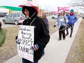 Intelligencer file photo
Canadian Hearing Society employees picket outside the Belleville office earlier this month. CUPE Local 2073 has filed an unfair labour practice complaint against the society.