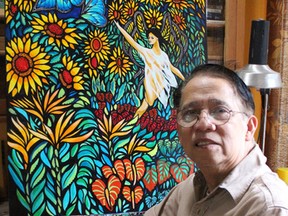 Sarnia artist Jorge de Guzman is pictured here in his studio Friday. The 68-year-old retired graphic artist has been selected to offer a three-day painting workshop at Loyalist College this summer. Barbara Simpson/Sarnia Observer/Postmedia Network