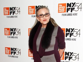 In this Monday, Oct. 10, 2016, file photo, actress Carrie Fisher attends a special screening of, "Bright Lights: Starring Carrie Fisher and Debbie Reynolds," at Alice Tully Hall in New York. The creators of Amazon's "Catastrophe," which stars Fisher in one of her final roles, said news of her death Dec. 27, 2016, was "utterly shocking." "We had no idea. I don't think she had any idea," said series star and co-creator Rob Delaney of possible warning signs or health concerns for the 60-year-old actress. (Photo by Andy Kropa/Invision/AP, File)