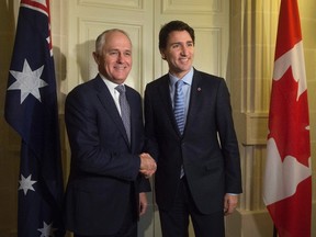 Canadian Prime Minister Justin Trudeau meets with Australian Prime Minister Malcolm Turnbull at the Commonwealths Heads of Government meeting in Birkirkara, Malta Saturday, November 28, 2015. (THE CANADIAN PRESS/Adrian Wyld)