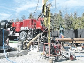 A drill rig extracts core samples from the depths of a proposed 680-metre deep geologic repository at the Bruce nuclear site, near Goderich. Many questions, such as the project?s emissions and ecological risks, remain unanswered. (Postmedia file photo)