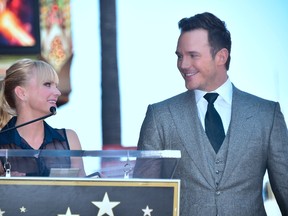 Actor Chris Pratt looks at his wife, actress Anna Faris, speaking at his Hollywood Walk of Fame Star ceremony on April 21, 2017 in Hollywood, California where Pratt was the recipient of the 2,607th Star in the category of Motion Picture. (FREDERIC J. BROWN/AFP/Getty Images)