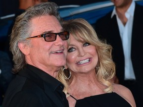 Actor Kurt Russell and actress Goldie Hawn arrive for the world premiere of the film 'Guardians of the Galaxy Vol. 2' in Hollywood, California. on April 19, 2017. (FREDERIC J. BROWN/AFP/Getty Images)