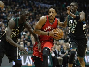 Toronto Raptors' DeMar DeRozan drives past Milwaukee Bucks' Tony Snell and Thon Maker during Game 3 on April 20, 2017. (AP Photo/Morry Gash)