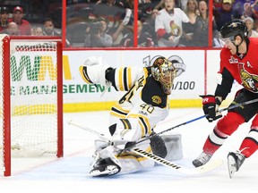 Tuukka Rask of the Boston Bruins stops the breakaway of Kyle Turris of the Ottawa Senators during double overtime NHL action at the Canadian Tire Centre in Ottawa, April 21, 2017. (Photo by Jean Levac)