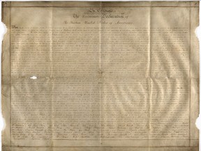 Undated handout photo of a parchment manuscript of the US Declaration of Independence, believed to date from the 1780s and found in a records office in Chichester, southern England. (West Sussex Record Office via AP)