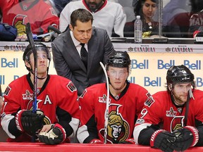 Senators head coach Guy Boucher stares intently as Kyle Turris, Ryan Dzingel and Bobby Ryan (left to right) wait for the next shift against the Bruins during Game 5 of their Eastern Conference playoff series in Ottawa on Friday, April 21, 2017. (Wayne Cuddington/Postmedia)