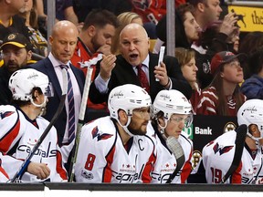 Capitals head coach Barry Trotz talks to his players during NHL action against the Bruins in Boston on April 8, 2017. (Winslow Townson/AP Photo)