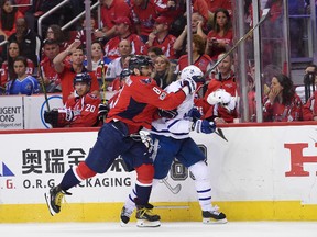 Capitals captain Alex Ovechkin (8) shoves Maple Leafs defenceman Nikita Zaitsev (22) during the second period of Game 5 of their first-round NHL playoff series in Washington on Friday, April 21, 2017. (Nick Wass/AP Photo)