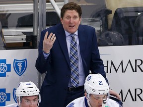 Maple Leafs coach Mike Babcock stands behind the bench earlier in the first-round series against the Washington Capitals. (AP)