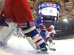 Brendan Gallagher #11 of the Montreal Canadiens shoots the puck against Marc Staal #18 and Henrik Lundqvist #30 of the New York Rangers n Game Six of the Eastern Conference First Round during the 2017 NHL Stanley Cup Playoffs at Madison Square Garden on April 22, 2017 in New York City. (Photo by Bruce Bennett/Getty Images)