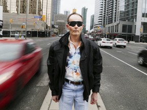Resident Blake Jacobs is upset over the proposed bike lanes on Yonge St. north of Sheppard Ave. (VERONICA HENRI/TORONTO SUN)