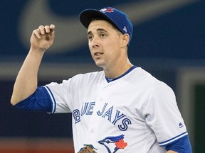 Toronto Blue Jays starting pitcher Aaron Sanchez is back on the disabled list a right middle finger blister flared up in a brief 13 pitch return. (FRED THORNHILL/The Canadian Press files)