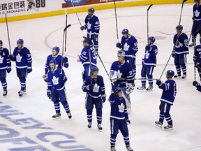The Maple Leafs salute their fans one final time following last night's overtime loss to the Capitals at the ACC. (Michael Peake, Toronto Sun)