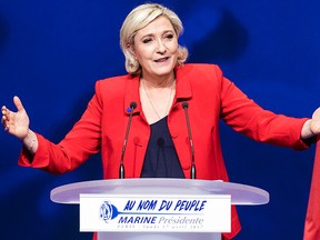 In this Monday, April 17, 2017 file photo, far-right candidate for the presidential election Marine Le Pen speaks during a campaign meeting in Paris.  (AP Photo/Kamil Zihnioglu, file)