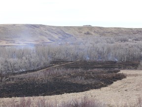 A photo of a grass fire on March 23. 2016, near the Castle dam.