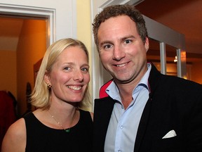 Conservative columnist Scott Gilmore (right) is seen with his wife Catherine McKenna, now Liberal environment minister, in this 2011 file photo. (Caroline Phillips/Postmedia)