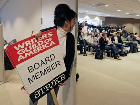 In this Feb. 10, 2008, file photo, Writers Guild of America board member Nancy De Los Santos, who's also a film and television writer, waits for a news conference to start in Los Angeles. Members of the Writers Guild of America are one step closer to striking come May 2, 2017. In a letter to its members Monday, April 24, the WGA said 96.3 percent voted to authorize a strike as the May 1 contract expiration deadline looms. (AP Photos/Ric Francis, File)