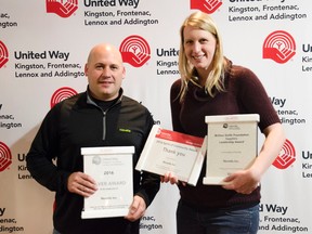 Jake Czyz and Kayla Kent of Novelis are awarded the United Way Silver award, 2016 Spirit of Community award and the Sapphire Britton Smith Foundatuion award at the United Way award luncheon Tuesday. (Gracie Postma/The Whig-Standard