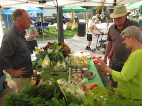 Will Freeman of Freedom Farm chats with customers. (JC Simko/Supplied photo)