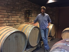 Jamie Quai of Quai du Vin Estate Winery has a reason to smile, and this time it’s not his award-winning creations. The area winemaker is one of the St. Thomas and District Chamber of Commerce’s Free Enterprise Award recipients — an annual honour that recognizes business excellence and community contributions. (Jennifer Bieman/Times-Journal)