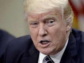 US President Donald Trump speaks before signing the Executive Order Promoting Agriculture and Rural Prosperity in America during a roundtable with farmers in the Roosevelt Room of the White House on April 25, 2017 in Washington, DC. (Photo by Olivier Douliery-Pool/Getty Images)