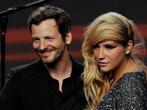 Lukasz 'Dr. Luke Gottwald and singer Ke$ha pose onstage at the 28th Annual ASCAP Pop Music Awards at the Kodak Ballroom on April 27, 2011 in Los Angeles, California. (Photo by Kevin Winter/Getty Images)