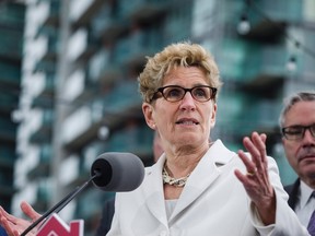 Premier Kathleen Wynne's three-year pilot project in which the government will select 4,000 low-income households from Hamilton, Thunder Bay and Lindsay, sets off alarm bells. (THE CANADIAN PRESS/PHOTO)
