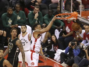 Toronto Raptors guard Norman Powell goes airborne for the slam during the fourth quarter of Game 5 in Toronto on April 25, 2017. (Jack Boland/Toronto Sun/Postmedia Network)