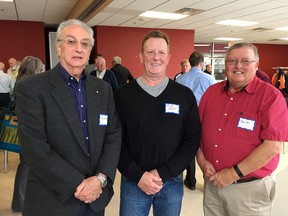 Peter Radley, left, representing his father Kingston Sports Hall of Fame inductee Yip Radley with fellow inductees Mike Knott and John Hall at the annual hall of fame luncheon at the Invista Centre on Tuesday. (Ian MacAlpine/The Whig-Standard)