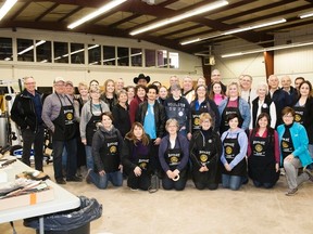 Rotary Club of Vermilion members and friends gathered together prior to officially opening the tenth annual garage sale on Thursday, April 20. Taylor Hermiston/Vermilion Standard/Postmedia Network.