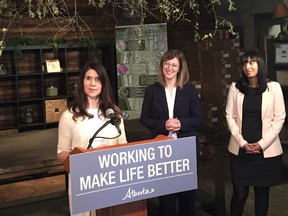 Carrie Belcourt, the owner of Mother Earth Essentials, speaks about her experience as an entrepreneur on April 25, 2017. Status of Women Minister Stephanie McLean (left) and Marcela Mandeville, the CEO of Alberta Women Entrepreneurs, look on.