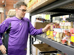 North Bay Food Bank volunteer James Nadeau puts donations on the food bank's shelves, Tuesday.
Jennifer Hamilton-McCharles / The Nugget