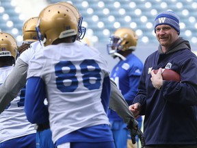 Head coach Mike O'Shea is in a good mood during the Winnipeg Blue Bombers spring camp at Investors Group Field in Winnipeg on Wed., April 26, 2017. Kevin King/Winnipeg Sun/Postmedia Network