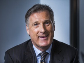 Maxime Bernier talks with reporters at Postmedia offices in Toronto, Ont. on Tuesday April 25, 2017. Bernier talked about going into the final debate in the race for the leadership of the Conservative Party of Canada. (Ernest Doroszuk/Postmedia Network )