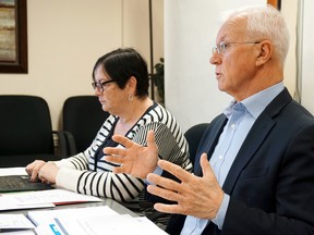 South East LHIN chief executive officer Paul Huras speaks at at board meeting Monday in Belleville. With him was chairwoman Donna Segal. (Luke Hendry/Postmedia Network)