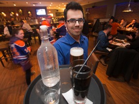 Underground Tap and Grill general manager Derek Mageau poses for a photo at the bar, 10004 Jasper Ave., in Edmonton Wednesday April 26, 2017. Photo by David Bloom