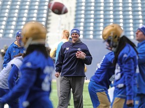 Mike O'Shea smiles as he looks over Blue Bombers mini-camp on Wednesday at Investors Group Field. (Kevin King/Winnipeg Sun/Postmedia Network)