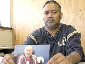 Richardo Boochoon holds a picture of his friend Ernest Guillemette, who died earlier this month. Boochoon says his friend didn't have the interpreter services he needed during his final days.
Jennifer Hamilton-McCharles / The Nugget