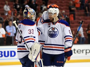 Adam Larsson congratulates Cam Talbot after their Edmonton Oilers defeated the Anaheim Ducks 5-3 in Game 1 of the Western Conference second round at Honda Center on Wednesday, April 26, 2017, in Anaheim, Calif. (Sean M. Haffey/Getty Images)