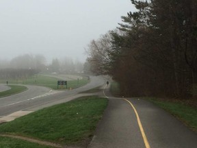 An early walker heads into the fog Thursday. Reader photo