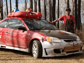 Marv Shine's car, made with his son, is a Honda Civic transformed with symbols remembering the 2016 Fort McMurray wildfires and has assistance items to help in a future disaster. Ian Kucerak / Postmedia