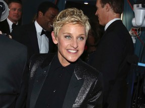 In this March 2, 2014 file photo, Ellen DeGeneres appears backstage during the Oscars in Los Angeles. DeGeneres made history 20 years ago as the first prime-time lead on network TV to come out, capturing the hearts of supporters gay and straight amid a swirl of hate mail, death threats and, ultimately, dark times on and off the screen. (Photo by Matt Sayles/Invision/AP, File)