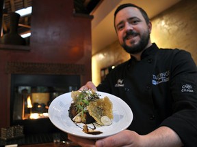 Chef Scott Wesseling of Black Trumpet presents seared scallops with orange-braised pork belly, vanilla cauliflower puree, enoki mushrooms, and tapioca coral. CHRIS MONTANINI\LONDONER\POSTMEDIA NETWORK