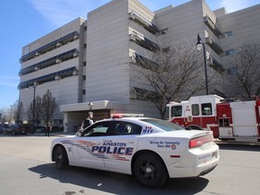 Emergency services respond to a bomb threat at 279 Wellington St. in Kingston on Thursday morning.
