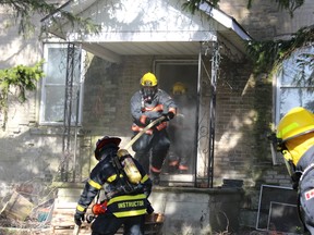 Bruce County firefighters took in real fire situations on April 22, 2017 outside Ripley. Both practical and theory training brought 140 firefighters together for two days of courses conducted at five different locations. An old farm house on Hwy 21 was set aflame multiple times during the training and firefighters learned different approaches to putting out fires on all levels in the home.