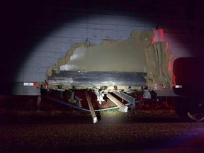 Nylon webties can be seen supporting the broken I-beams in a trailer stopped by OPP Tuesday night on Hwy 401 near Mallorytown. Handout