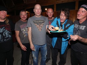 Personality Crisis ham it up in a North End rehearsal space on Wed., April 27, 2017, ahead of their reunion gig at the Pyramid Cabaret in Winnipeg on Friday. From left are: Mark Halldorson, Walter Kot, Mitch Funk, Duane Eddy (Froslov), Jon Card and Richard Duguay. Kevin King/Winnipeg Sun